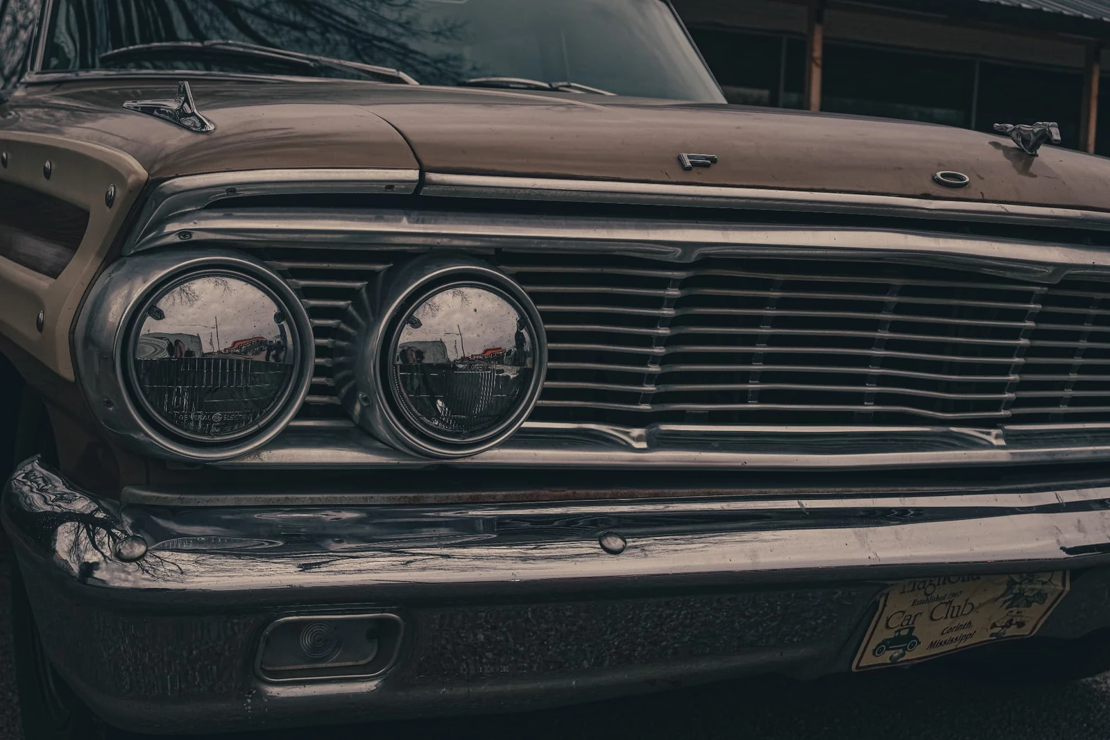 Moody close view of a vintage automobile grille photographed by Lindsey