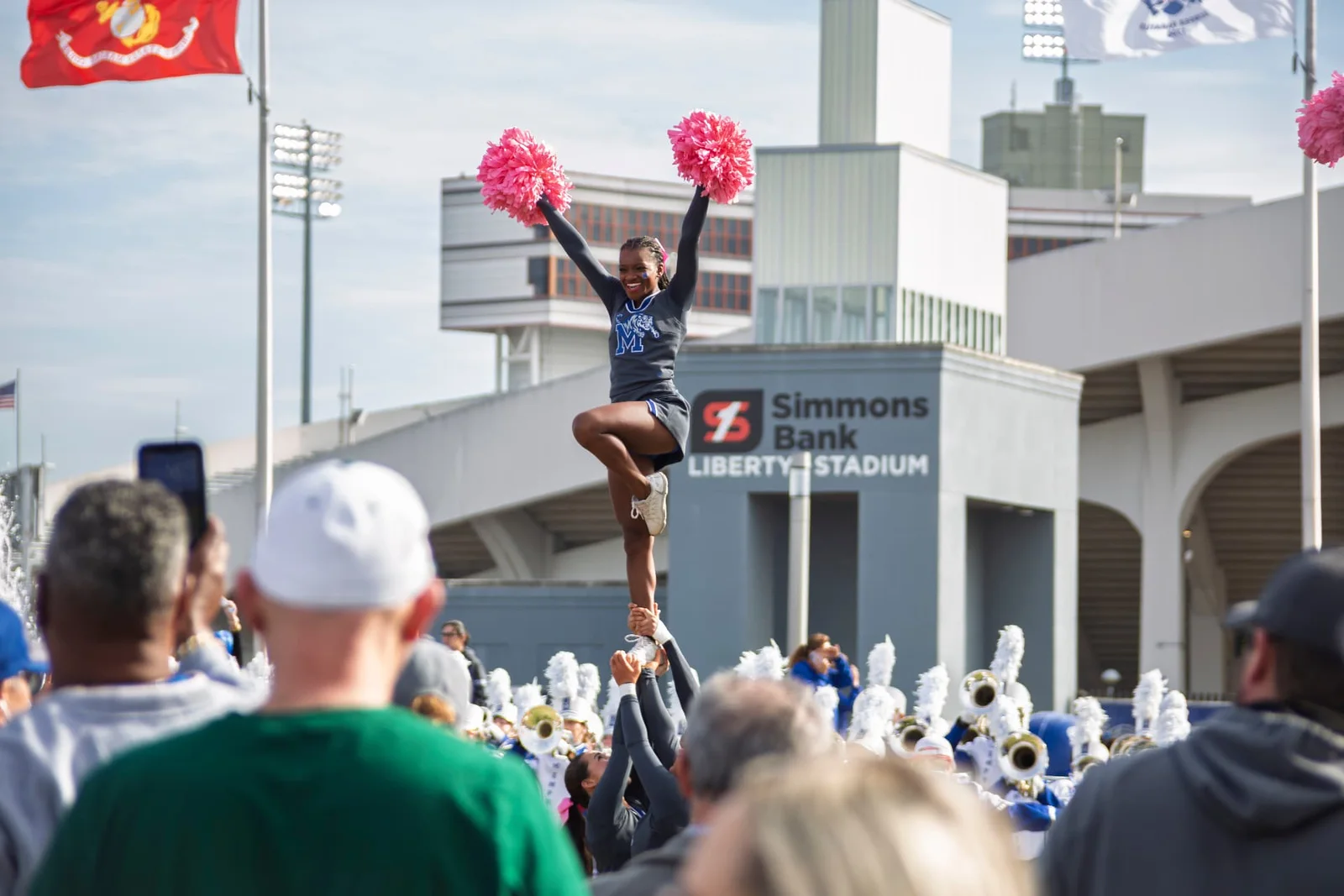 Cheerleader performing at a Memphis stadium event photographed by JOHN