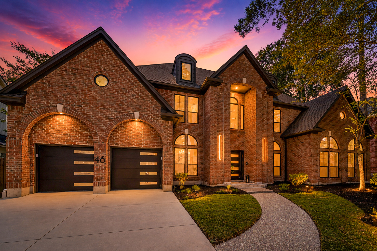 Twilight real estate exterior photograph of a brick home by Jose Rodriguez in Greater Houston, Texas