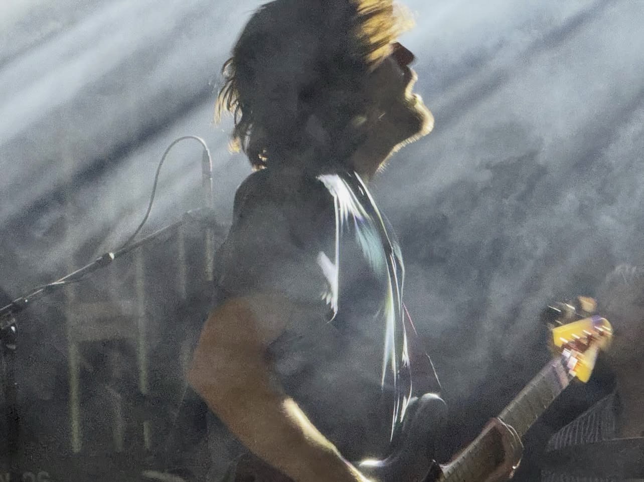 Stage performance photograph of a guitarist by JEFF in Austin, Texas